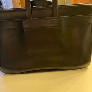 Coach 5351 Briefcase with suede lining. Good used condition. Both women and men.
